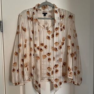 Floral blouse with optional bow and gold accents